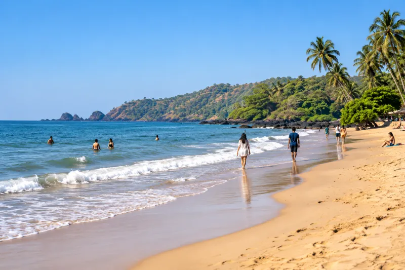 Visitors enjoying a clear November day on a Goa beach