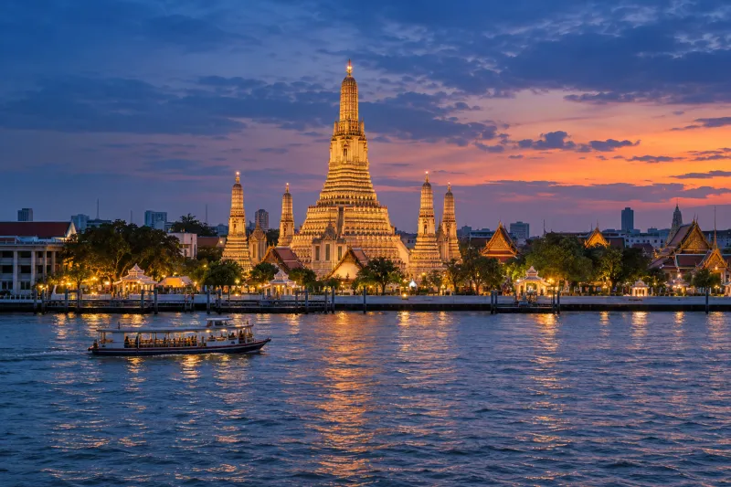 Wat Arun across the Chao Phraya River at dusk